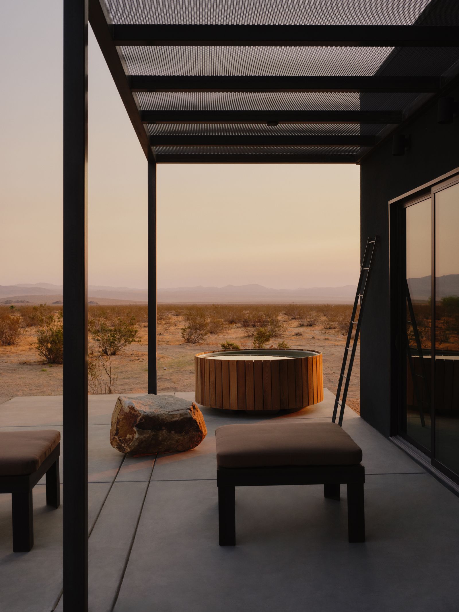 Through the pergola to the hot tub and open desert